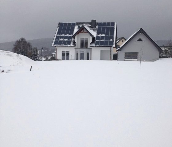 Vue de la maison en hiver, © FeWo Ruland