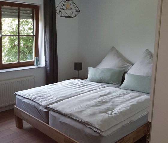 Schlafzimmer Ferienwohnung EIFELWILD|Adenau, © Schäfer|Ferienwohnung EIFELWILD|Adenau